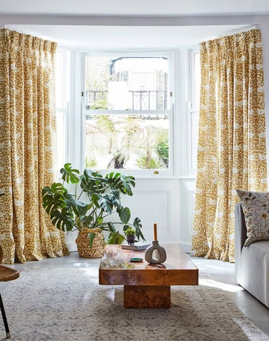 Curtains made with yellow Looting Fruits fabric