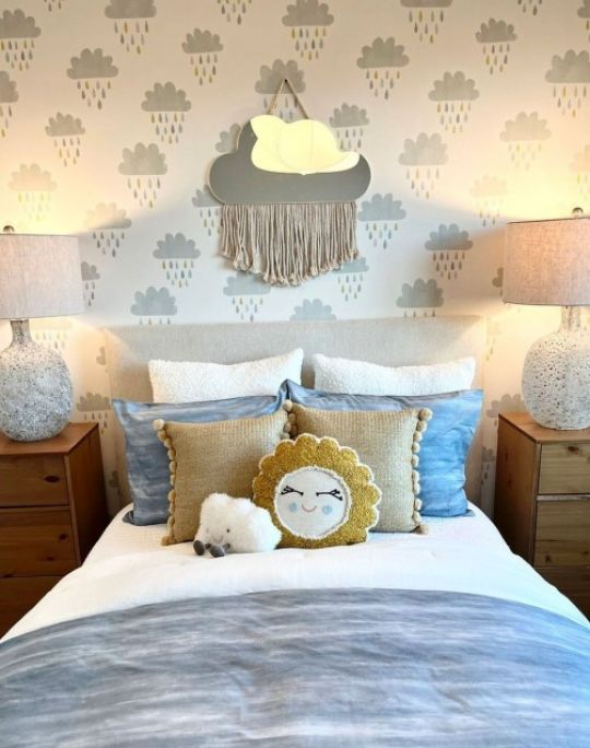 Kids room with cloudy wallpaper